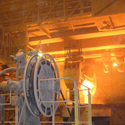 A Motor-Driven Reel in front of a Process Crane in the Metallurgy industry